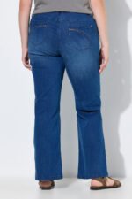 ekologiskos medvilnes moteriski platejantys dzinsai