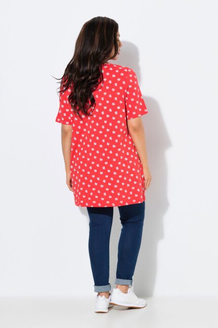 oranzine tunika su baltais taskais ir klostemis