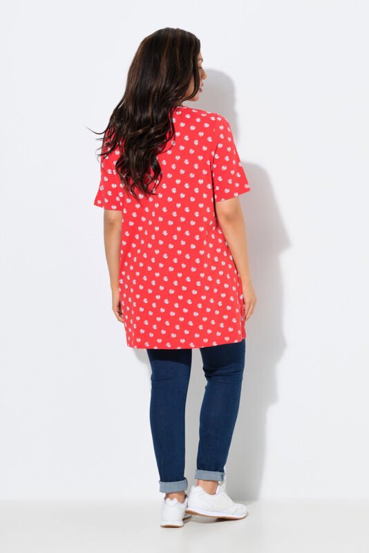 oranzine tunika su baltais taskais ir klostemis